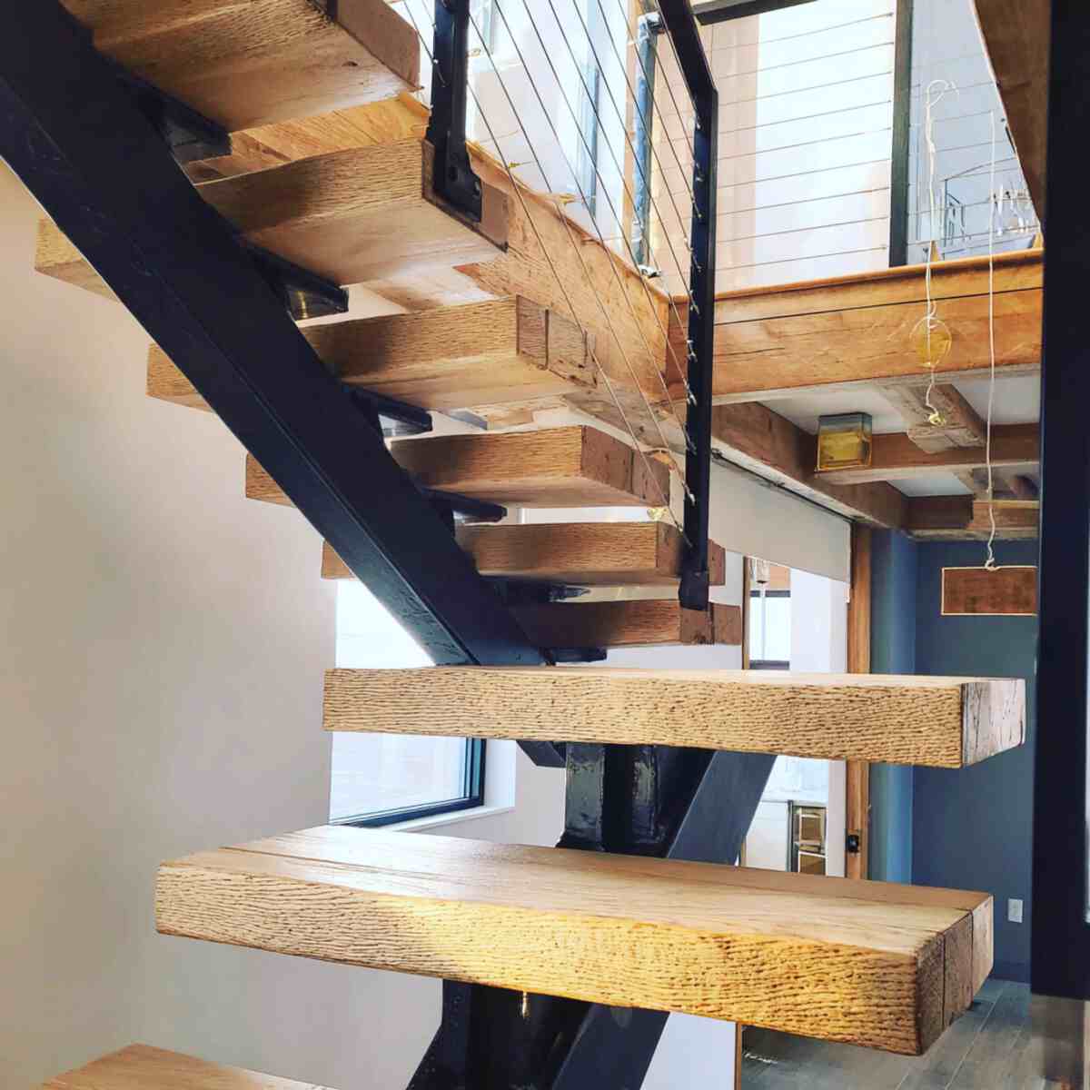 Floating Wooden Treads with Metal Stringers
