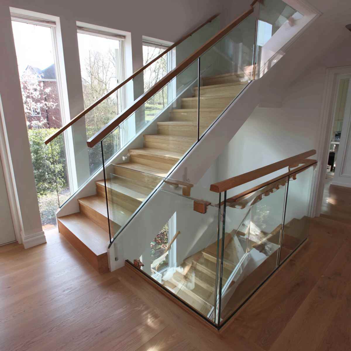 Glass Panels with Wooden Handrail