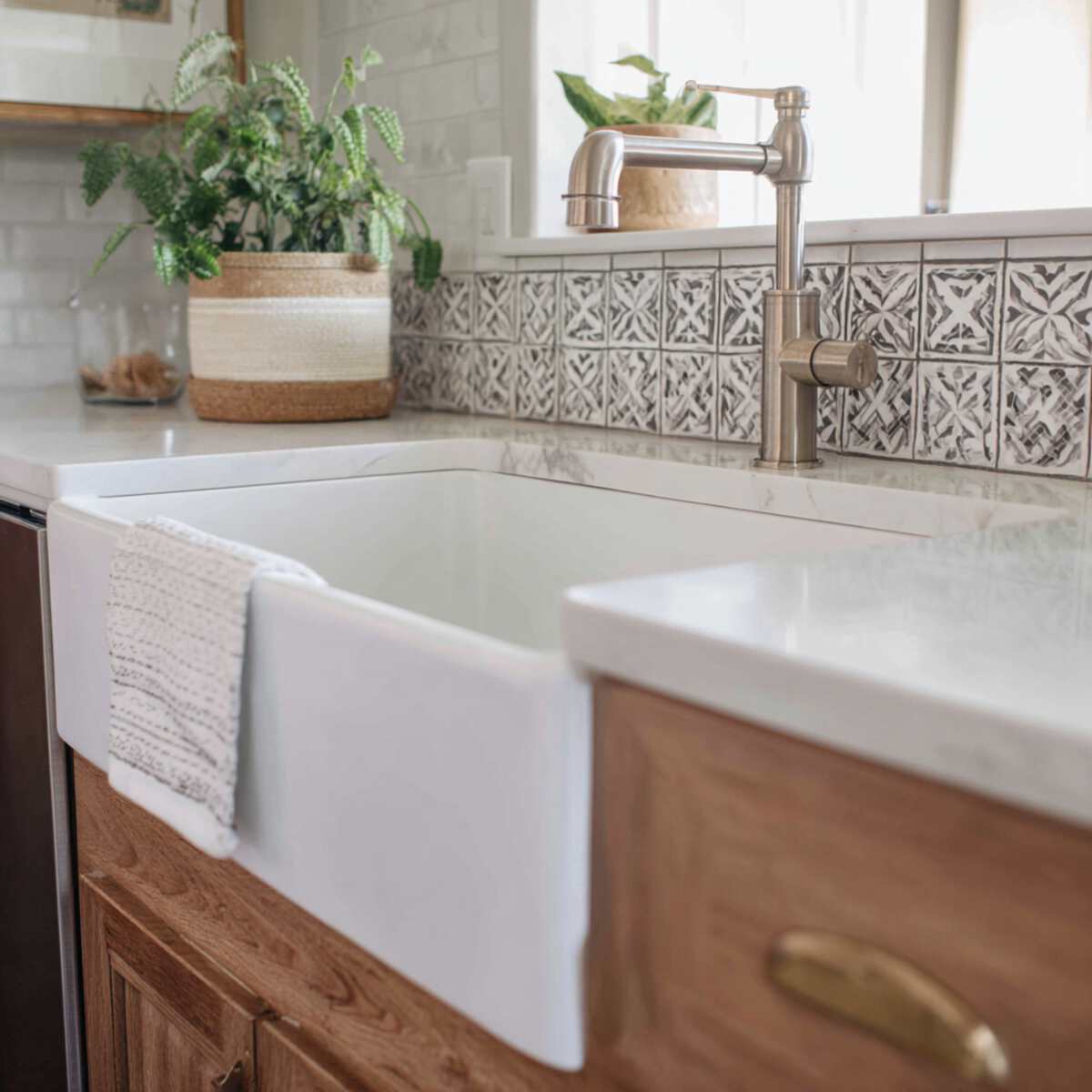 Farmhouse Sink with Patterned Tile Inlay Behind