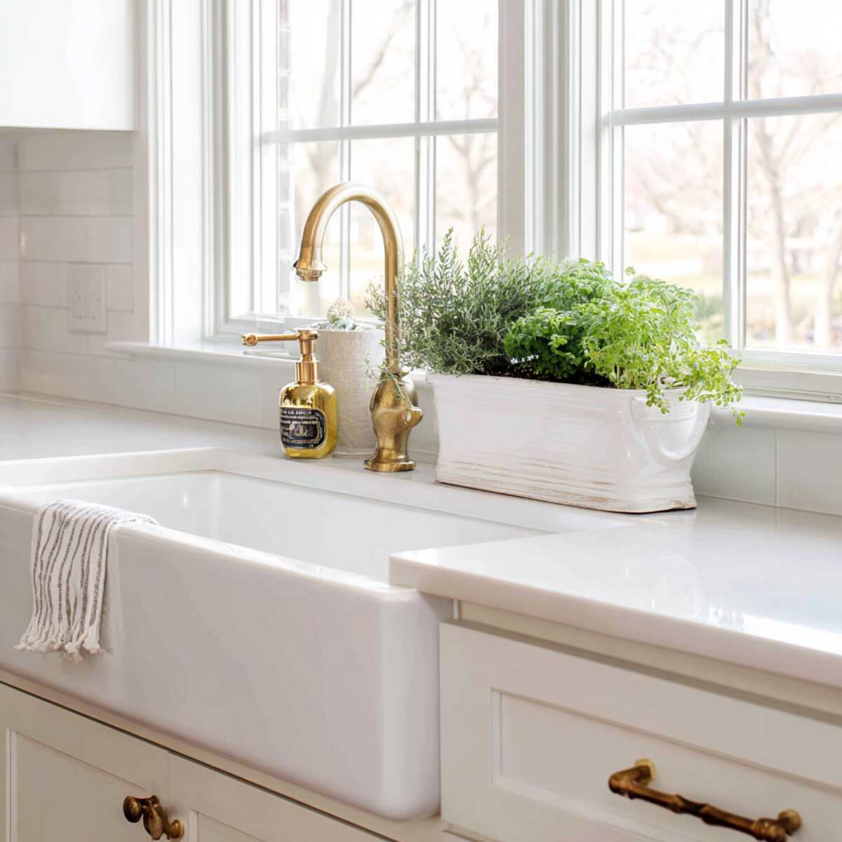 Traditional White Sink with Herb Planters on Sill