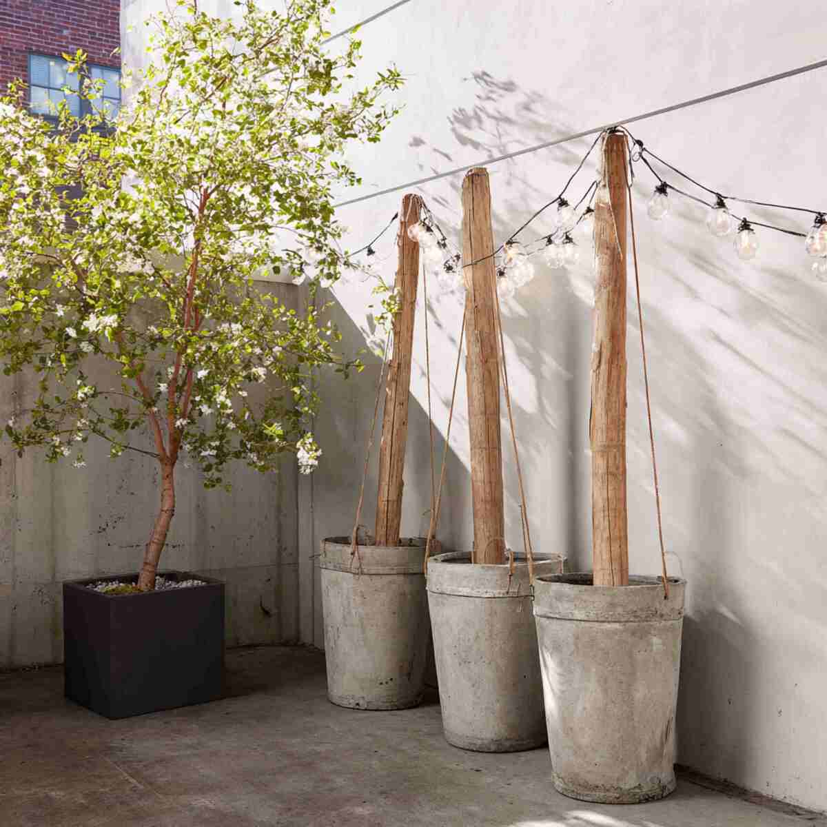 DIY Concrete-Filled Bucket Poles