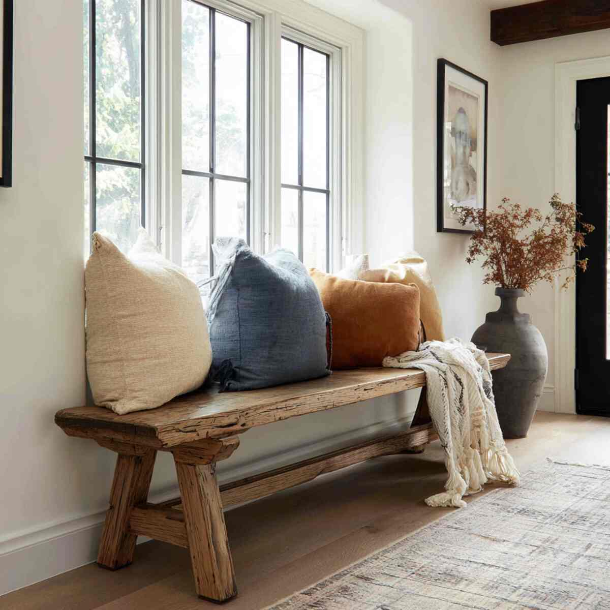 Rustic Wooden Bench with Throw Pillows
