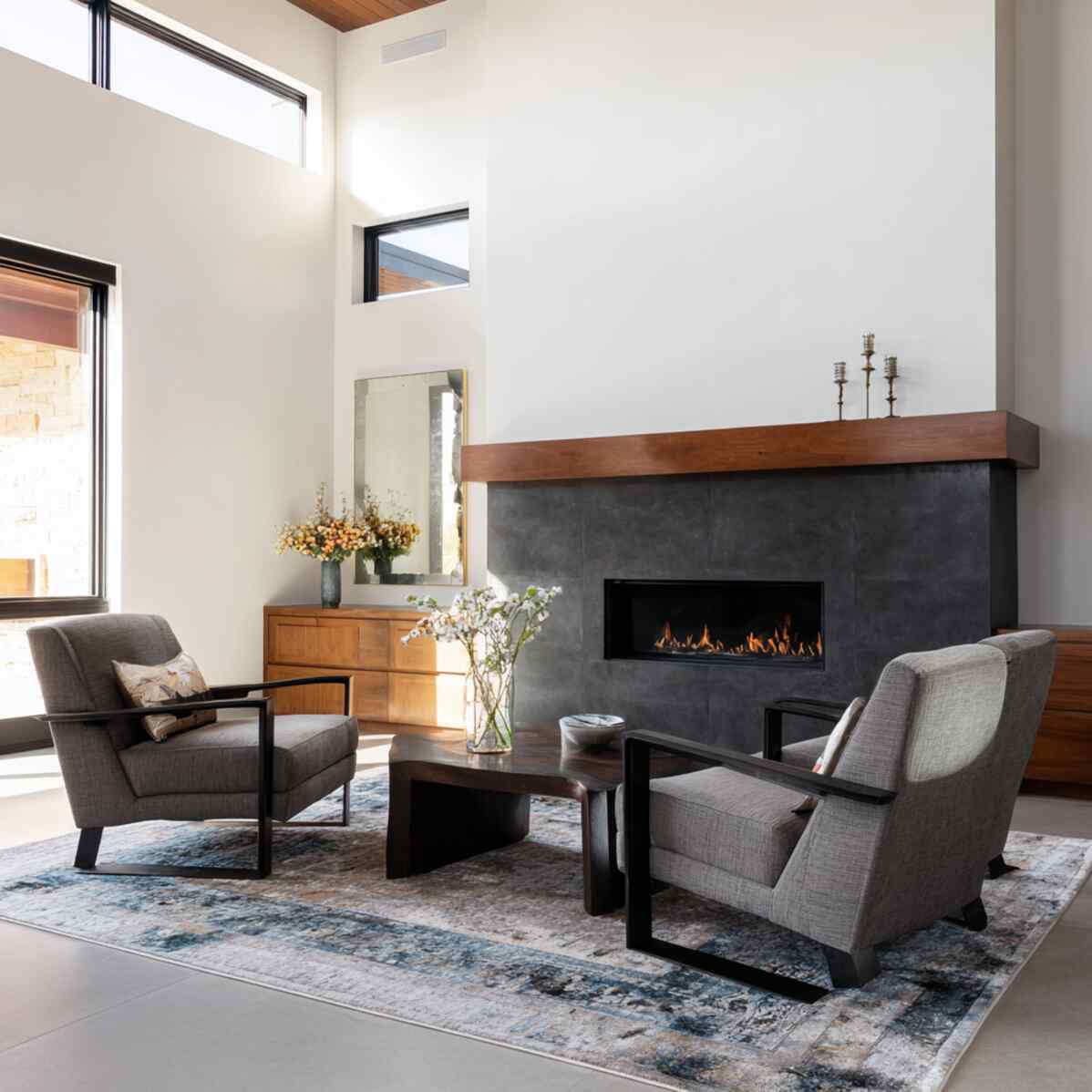 Pair of Armchairs Angled Toward a Fireplace